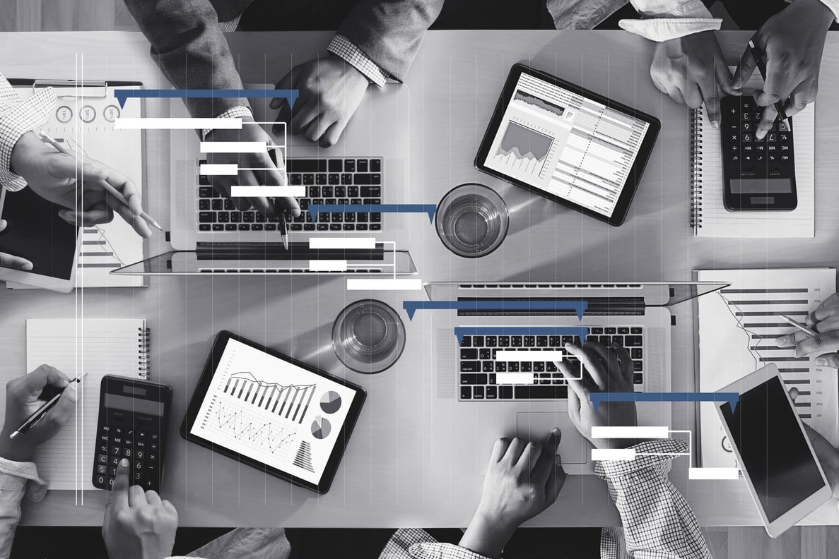 Business People Analyzing  PROJECT MANAGEMENT updating Gantt chart